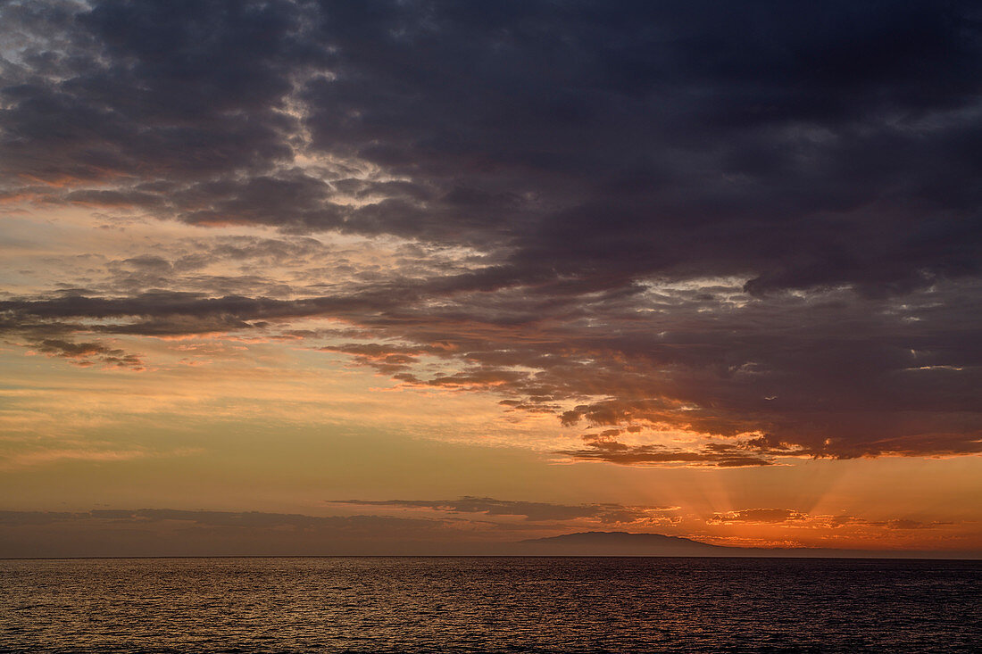 Mood of clouds above Atlantic Ocean with island El Hierro, from Valle Gran Rey, La Gomera, Canary Islands, Canaries, Spain