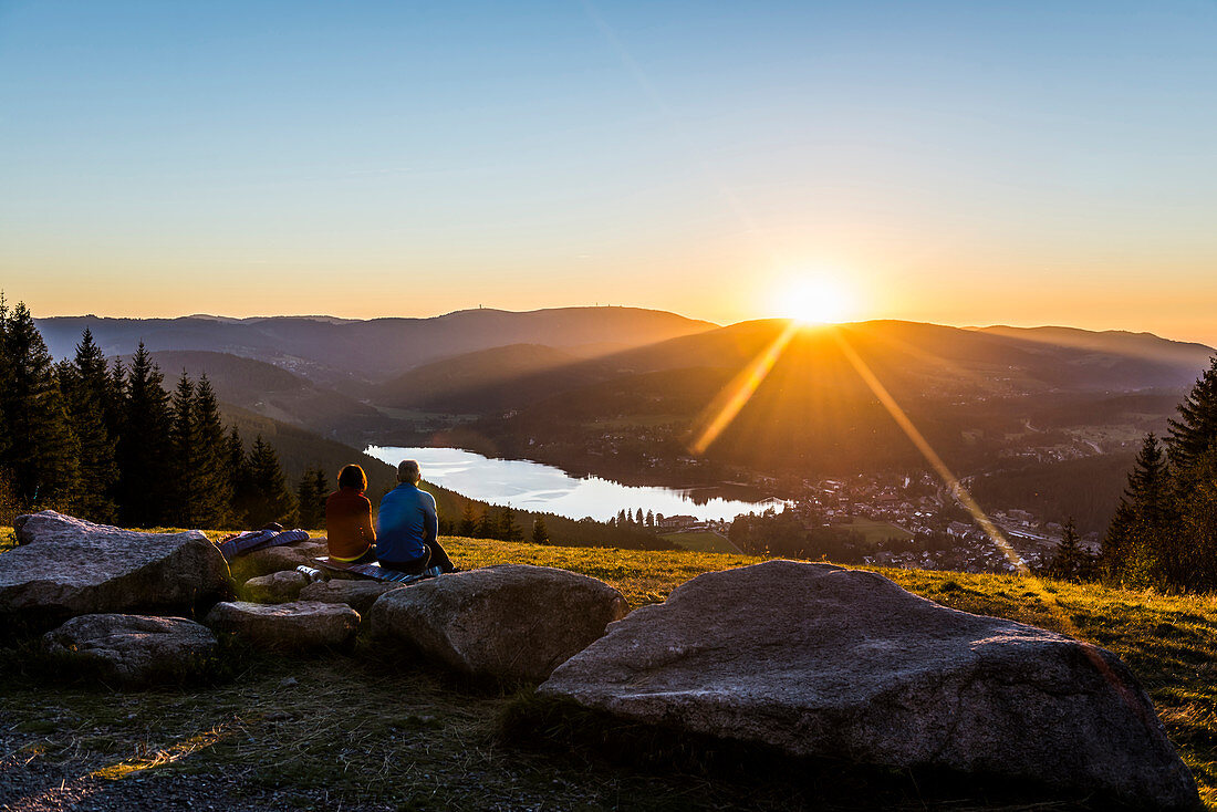 View from Hochfirst to Lake Titisee and Feldberg mountain at sunset, near Neustadt, Black Forest, Baden-Württemberg, Germany