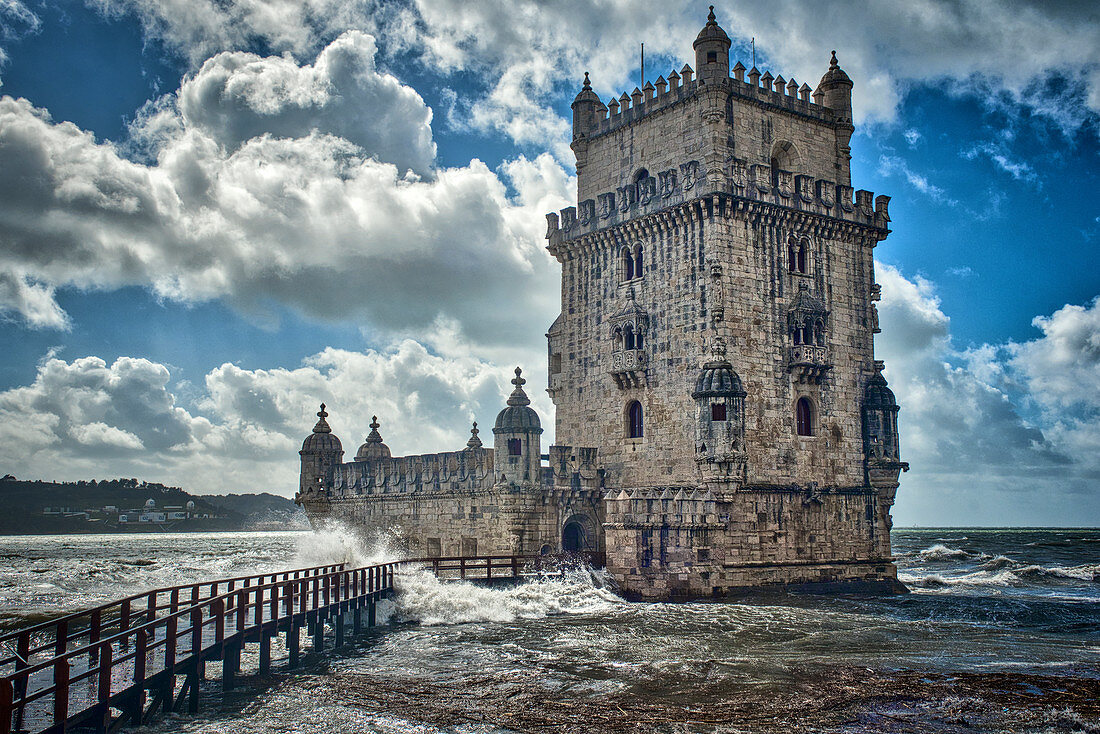 Stormy sea at the Torre de Belém at the mouth of the Tejo, Lisbon, Portugal
