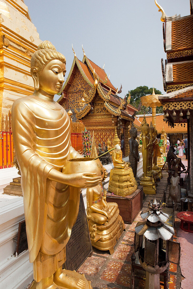 Buddha statue in Golden Buddhist Temple. Wat Prah That Doi Suthep, Chiang Mai, Thailand