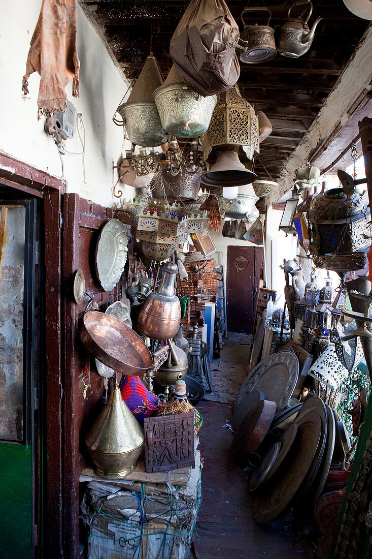 Souvenir shop with metal goods in the souks of the medina, Marrakech, Morocco