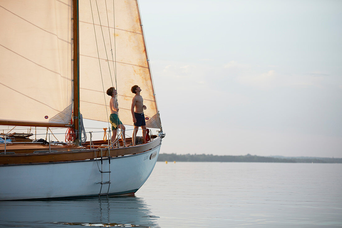 2 Adolescents on the bow, TWO-SIDED SIR SHACKLETON ON THE AMMERSEE Ammersee, Bavaria Germany * Lake Ammer, Bavaria, Germany