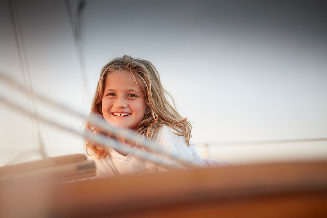 9-year-old girl on board the two-master Sir Shackleton, Ammersee, Bavaria, Germany