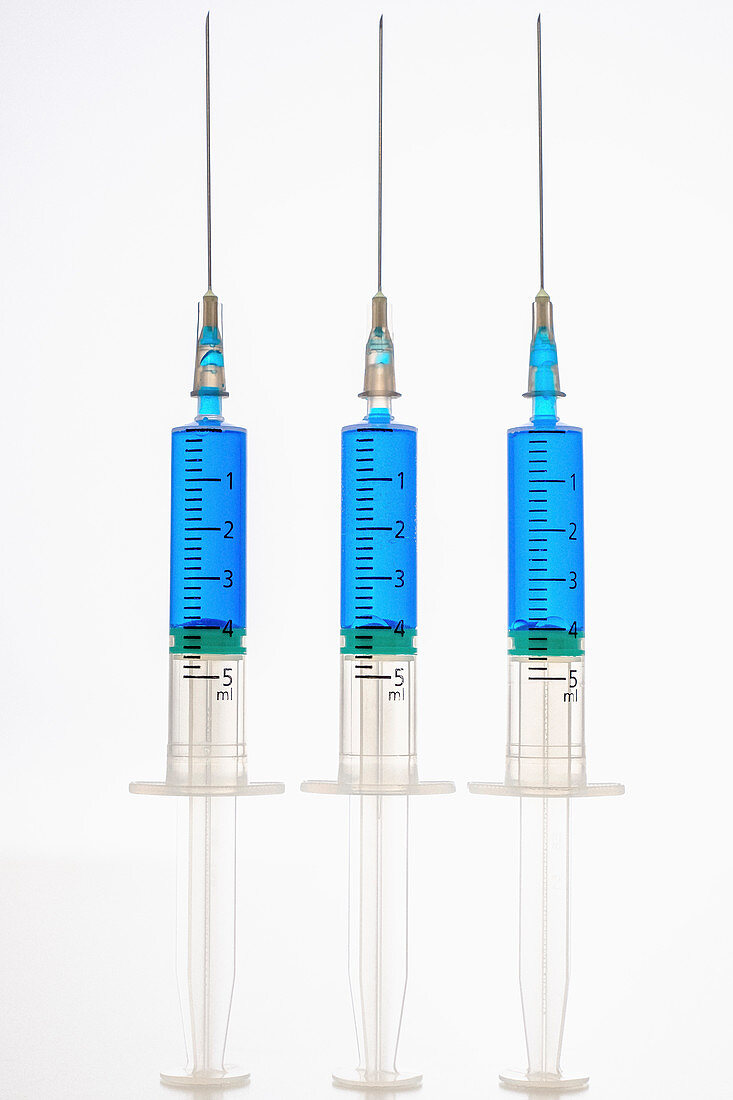Syringes with blue liquid