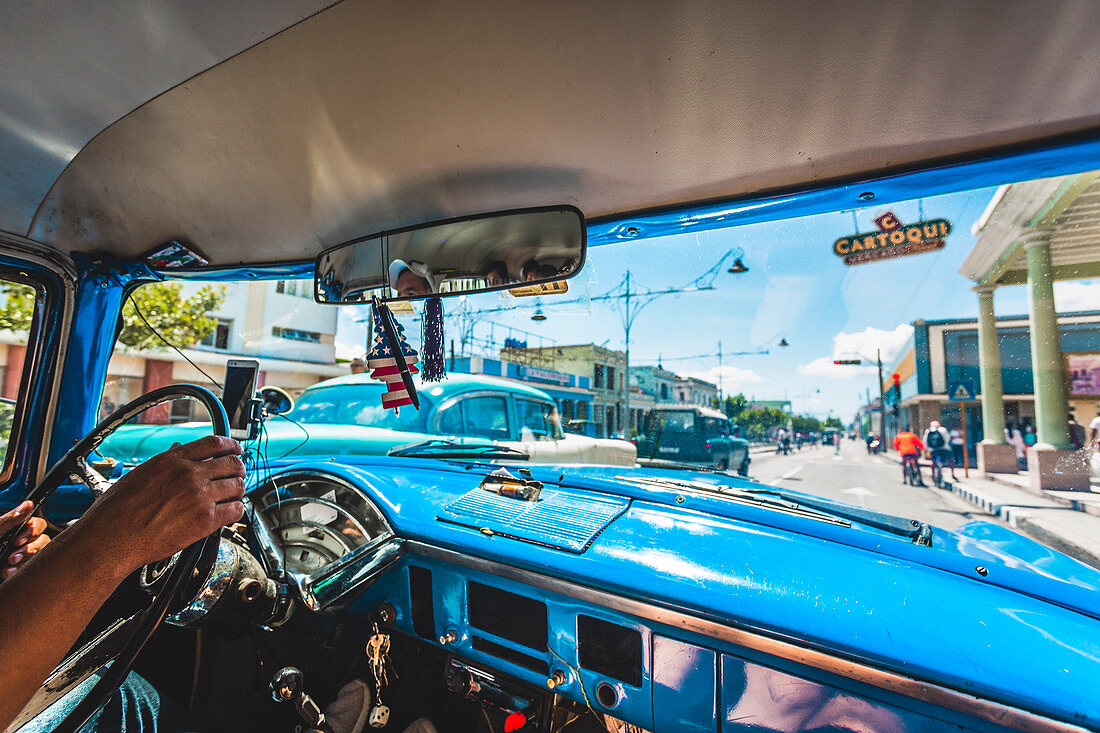 View from taxi in Cienfuegos, UNESCO World Heritage Site, Cuba, West Indies, Caribbean, Central America