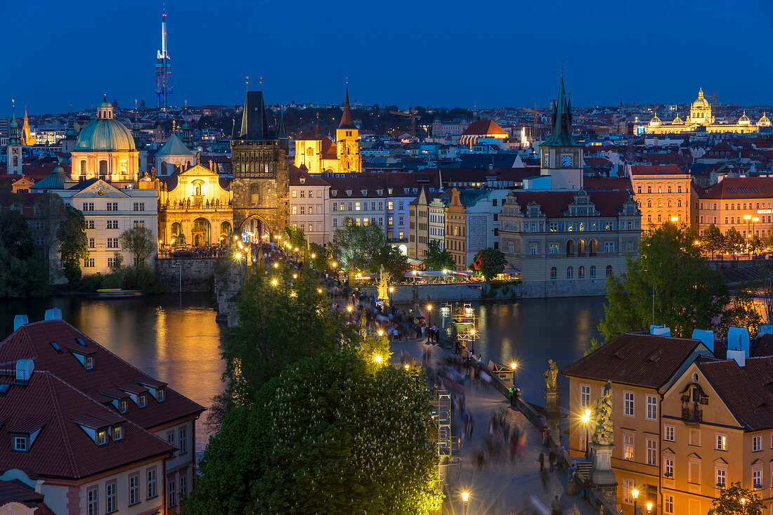 View from the Mala Strana Bridge Tower over Charles Bridge and the old town at dusk, UNESCO World Heritage Site, Prague, Bohemia, Czech Republic, Europe