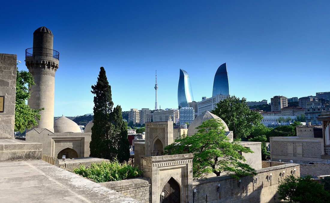 View from Shirvanshahs Palace with its mosque in the Old City to the Flame Towers, Baku, Caspian Sea, Azerbaijan, Asia