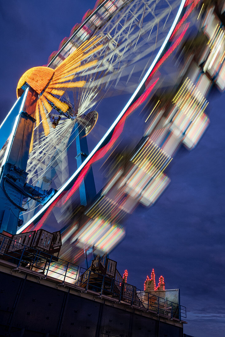 Ferris wheel Oktoberfest at the blue hour, Munich, Germany