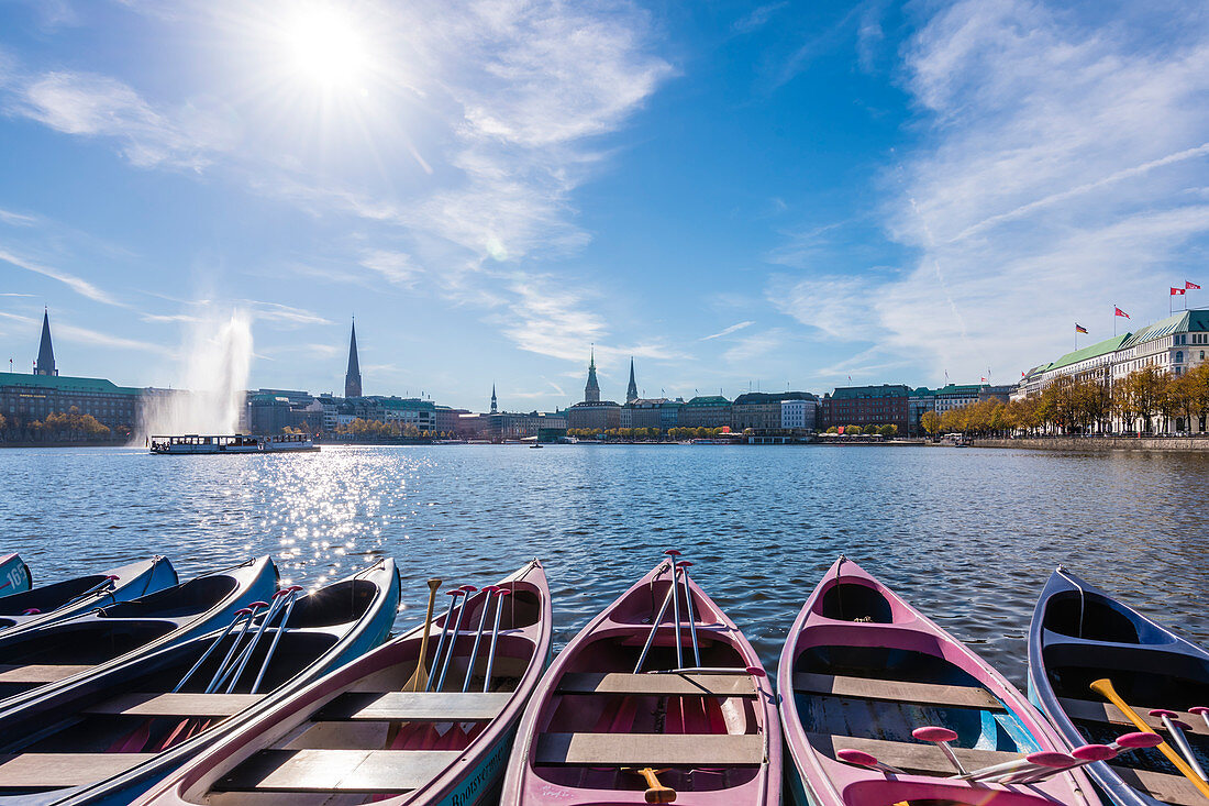 Panorama of the Binnenalster with canoe boats and excursion ship, Hamburg, Germany