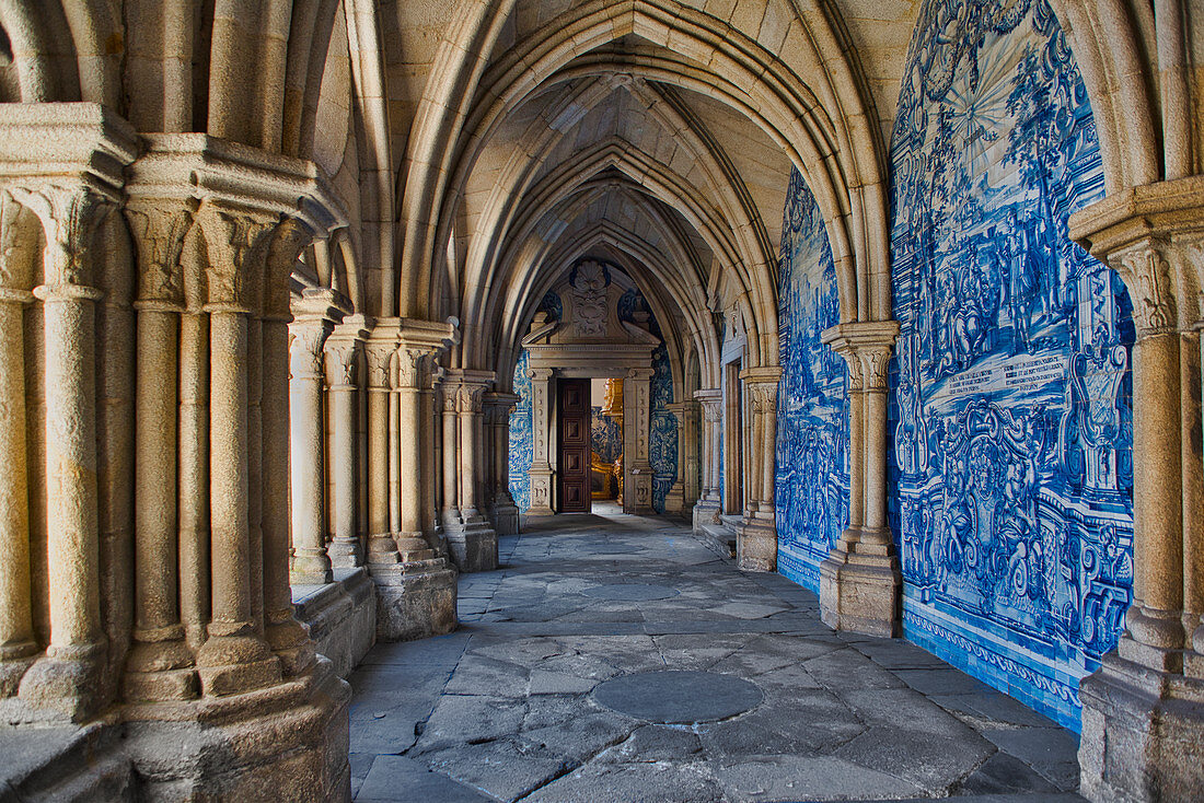 Cloister in the cathedral with blue azulejos in Porto, Portugal