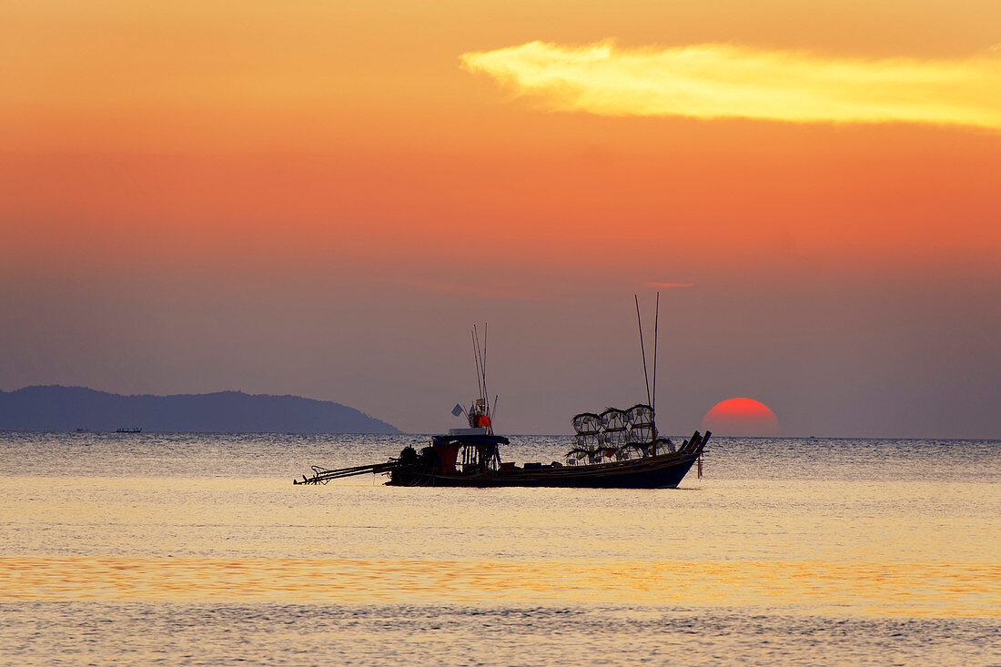 Sunset at Buffalo Bay, fishing boat, Koh Phayam, Thailand