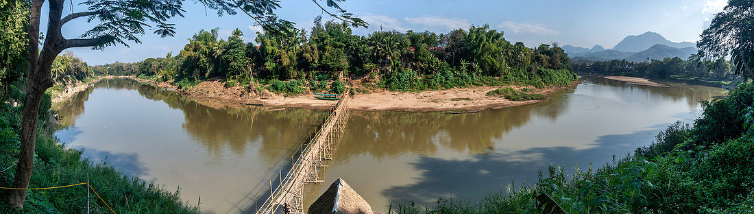 Bamboo bridge over the Nam Khan River, side branch of the Mokong River, Luang Prabang, Laos,