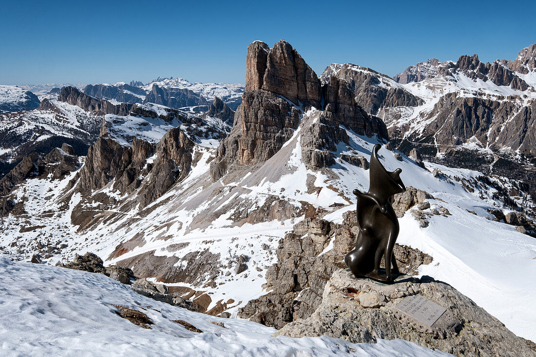 The Cinque Torri from Rifugio Nuvolau overlooking the Dolomites and in the foreground a monument to the fallen soldiers of the First World War, Cortina d'Ampezzo; Belluna; Italy