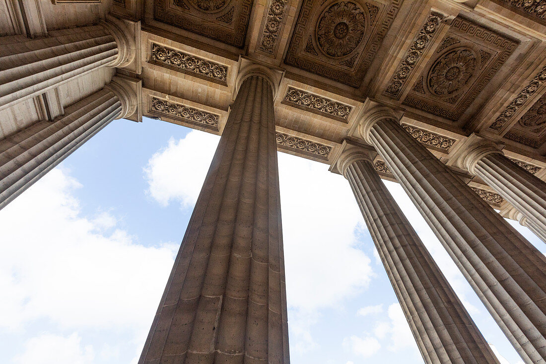 Columns and sculpted ceiling in Paris, France