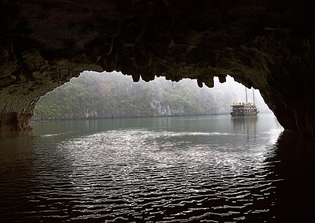 Chinese Junk Seen Through a Cave Entrance,Halong Bay, Quang Ninh, Vietnam