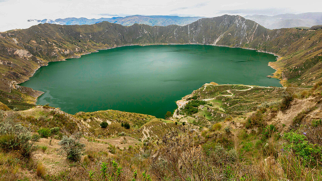View of the turquoise crater lake Quilotoa in Ecuador