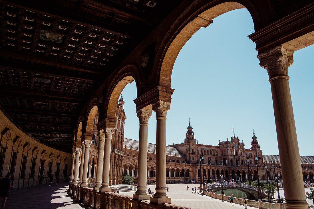 View of arches and columns in Alcazar Palace in Seville, Andalusia, Spain