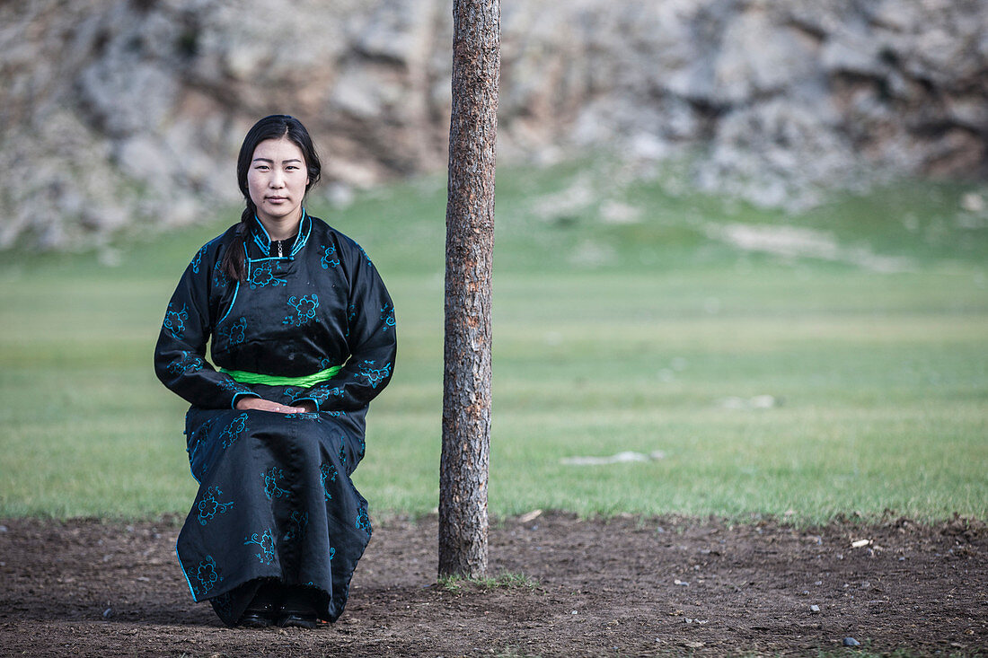 Mongolian woman wearing deel, traditional attire, Bunkhan, Bulgam, Mongolia