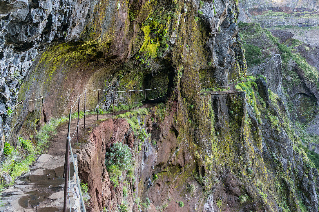 Rock tunnel on the trail from Pico Ruivo to Pico do Areeiro, Santana municipality, Madeira, Portugal, Europe