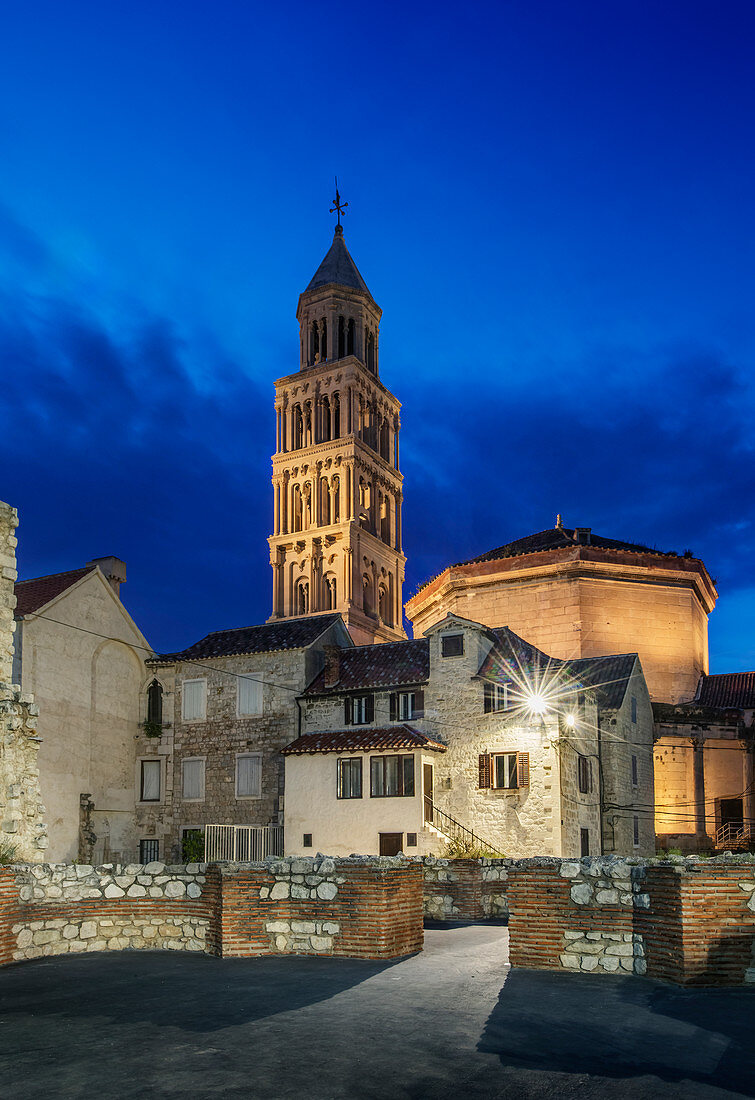 Buildings and tower illuminated at dusk, Split, Split, Croatia