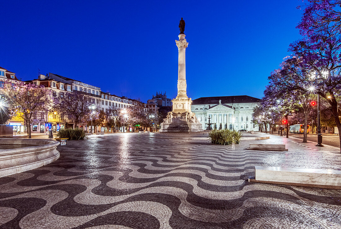 Rossio Square illuminated at night, Lisbon, Portugal