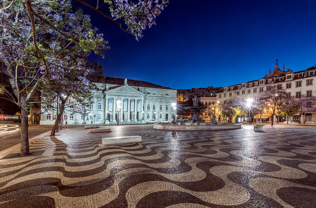 Rossio Square illuminated at night, Lisbon, Portugal