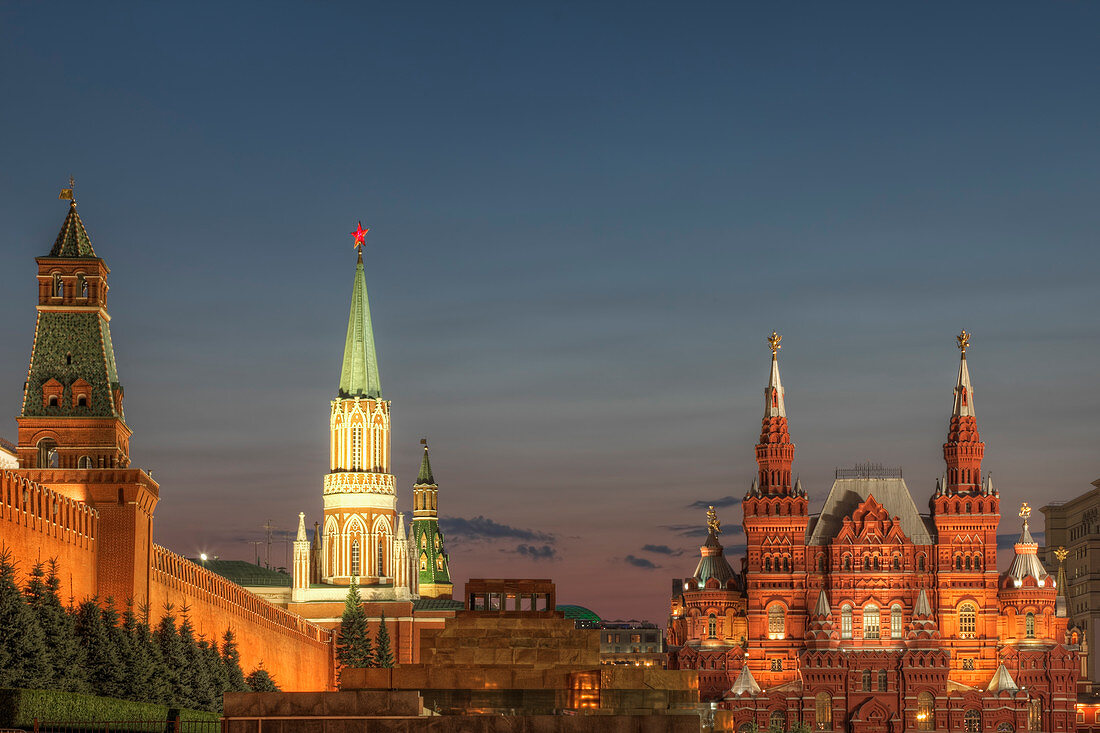 Illuminated ornate buildings, Moscow, Russia