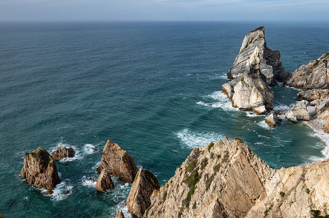 View from above on the rocks from Praia da Ursa beach, Colares, Sintra, Portugal