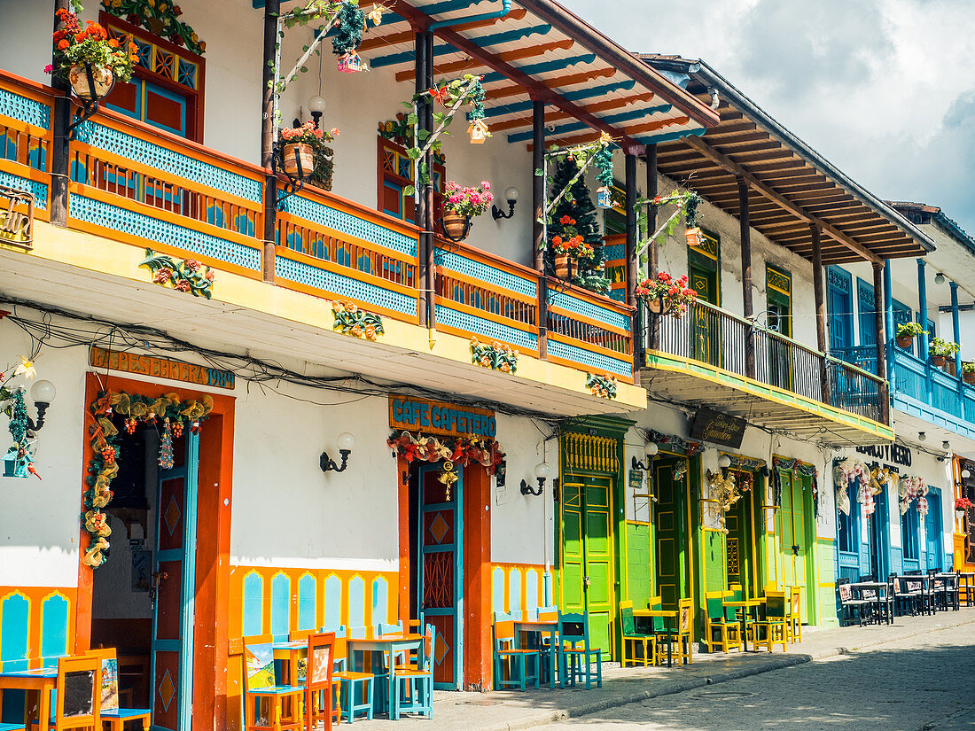 Colorful houses line the Parque Principal, Jardin, Antioquia, Colombia, South America