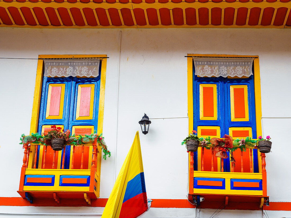 House painted in the colors of the Colombian flag (center), Filandia, Coffee Region, Colombia, South America