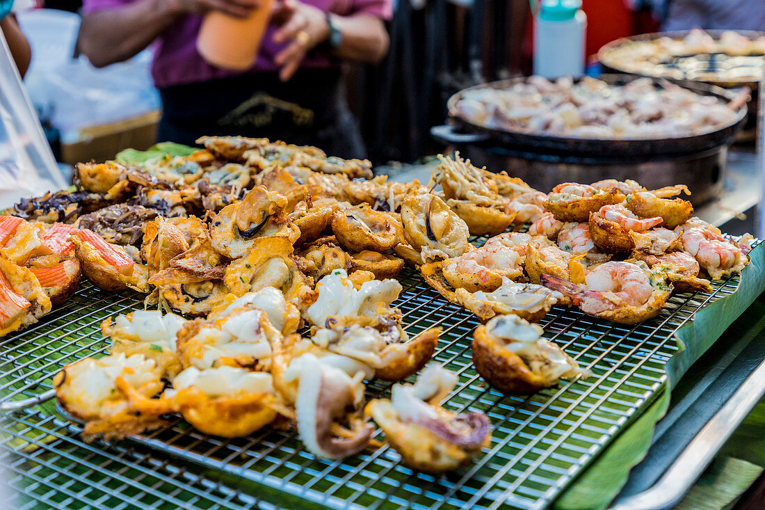 A fried seafood stall at the famous Walking Street night market in Phuket old Town, Phuket, Thailand, Southeast Asia, Asia