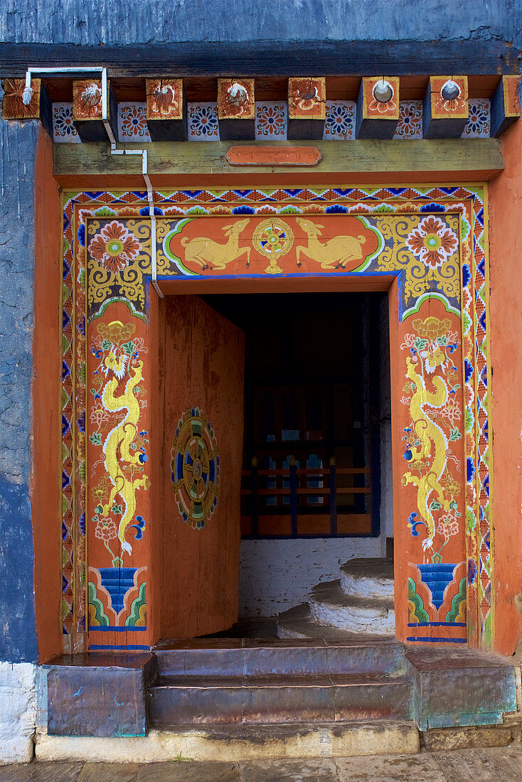 Colorful entrance gate to Jakar Dzong in Chamkhar Valley, Bumthang, Bhutan, Himalayas, Asia