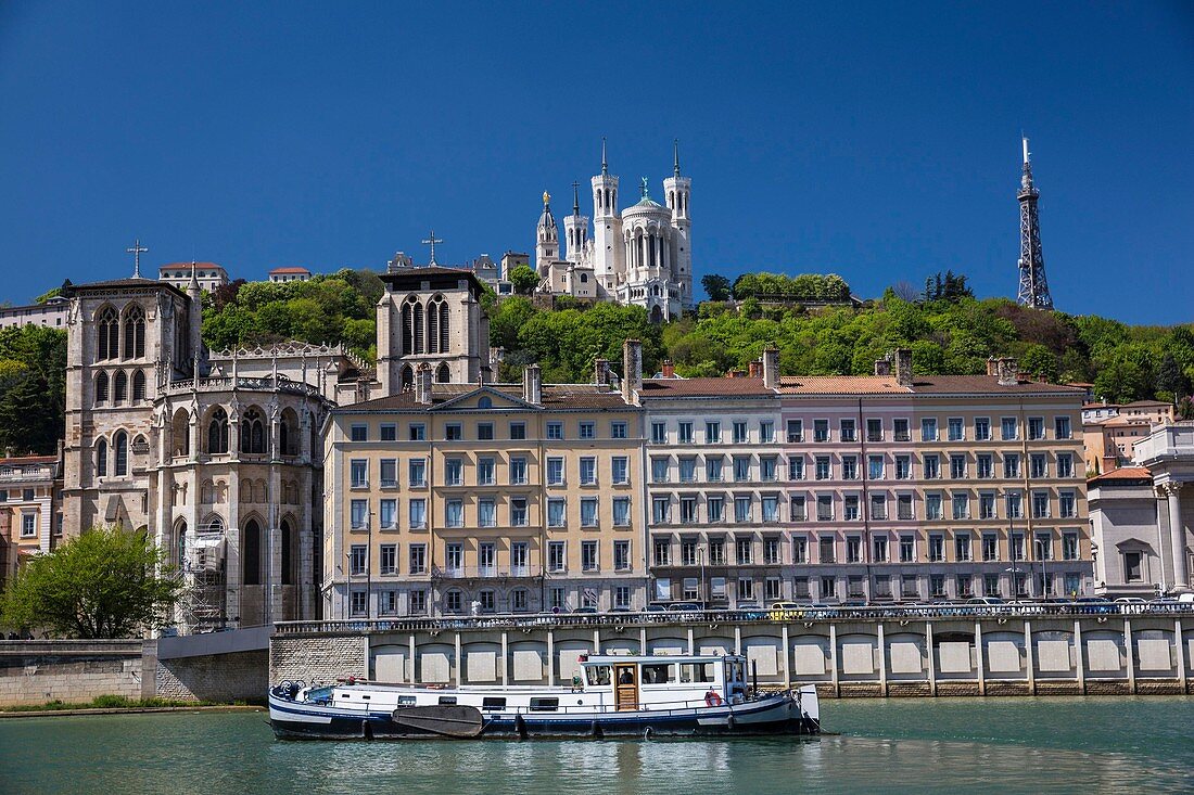 France, Rhone, Lyon, historical site listed as World Heritage by UNESCO, Vieux Lyon district, barge on the Saone, the Cathedral Saint Jean and the basilica Notre-Dame of Fourvière