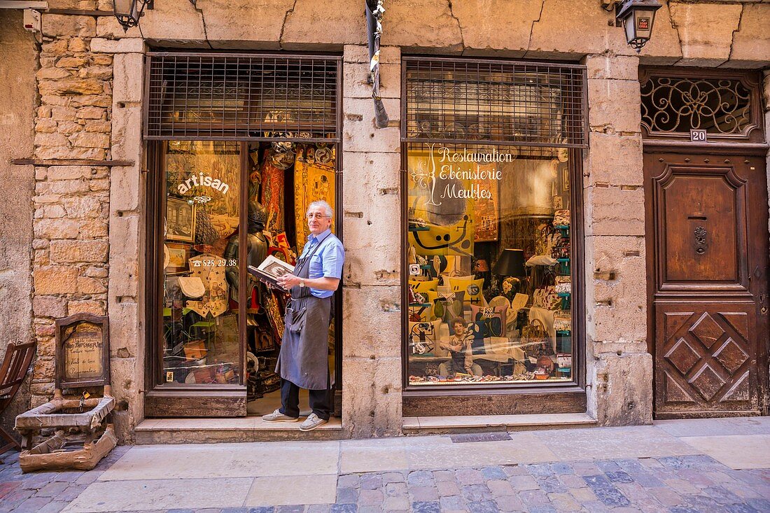 France, Rhone, Lyon, historical site listed as World Heritage by UNESCO, shop Au Tapissier d'Antan, craftsman tapestry-maker, cabinet maker, Saint-Paul district, Lainerie street, Vieux Lyon