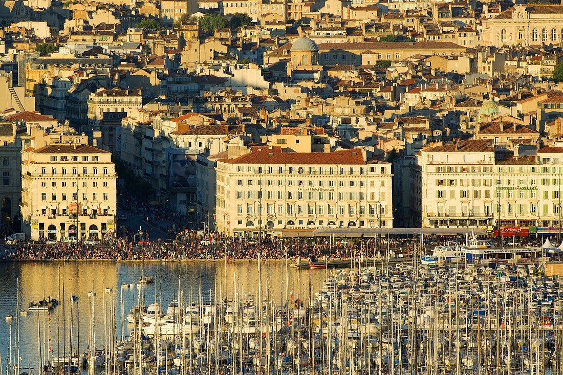 France, Bouches du Rhone, Marseille, Euromediterranean area, Vieux Port, crowd on the dock of the Fraternite during the national day