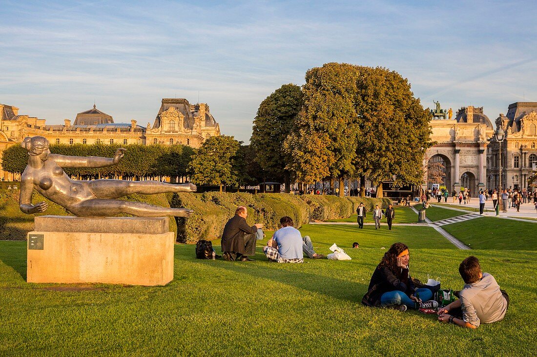 France, Paris, area listed as World Heritage by UNESCO, the Carrousel gardens, statues and Mayol Louvre in the background