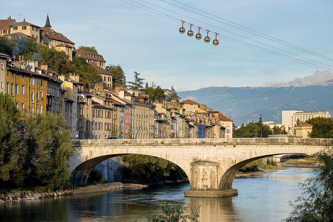 France, Isere, Grenoble, Saint Laurent district on the right bank of Isere river, Marius Gontard bridge and Grenoble-Bastille cable car and its Bubbles, the oldest city cable car in the world