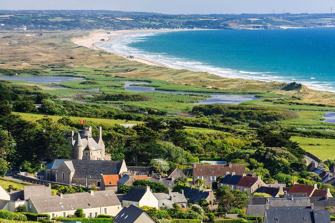 France, Manche, Cotentin, Cap de la Hague, Vauville, 17th century Vauville castle and 12th century Saint Martin church, Anse de Vauville in the background