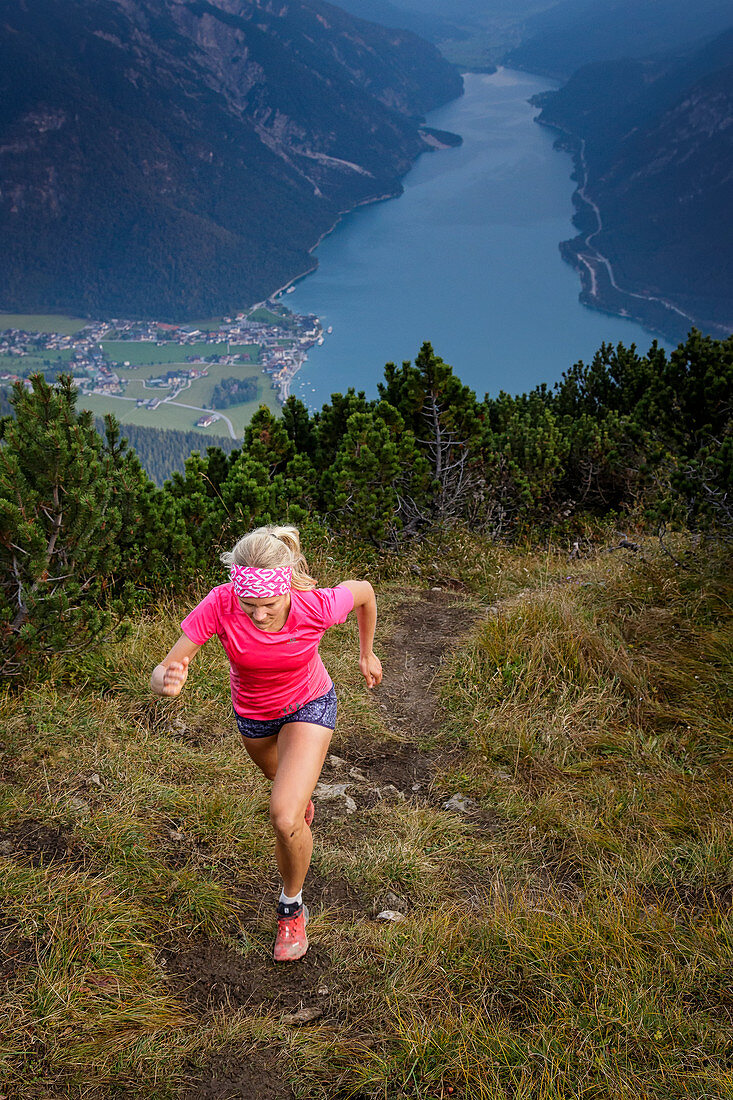 Mountain runner on the way to the Bärenkopf high above the Achensee, Tyrol, Austria