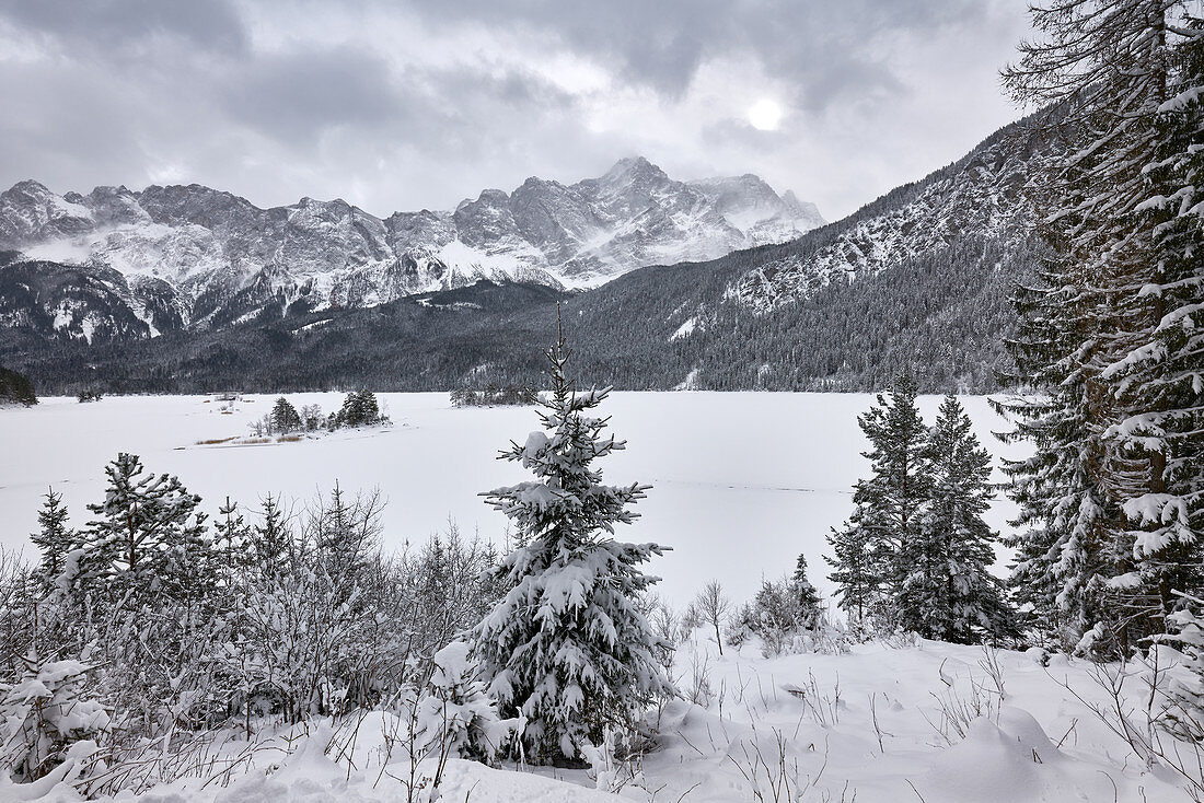 Winter at the Eibsee below the Zugspitze, one of the most beautiful mountain lakes in Bavaria, Bavaria, Germany