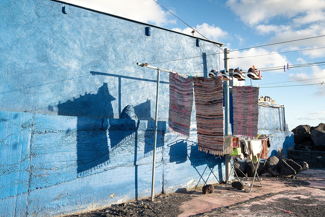 View of shadows on a house wall in the fishing village of la Bombilla, La Palma, Canary Islands, Spain, Europe