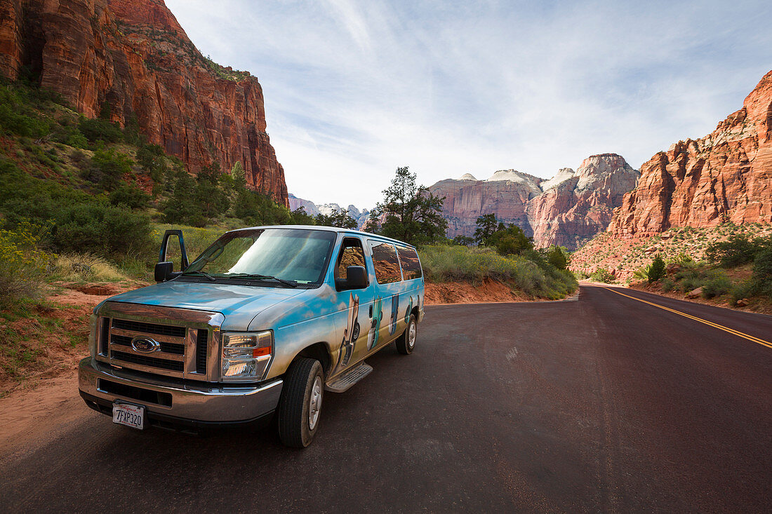 Road with van through Zion National Park, USA