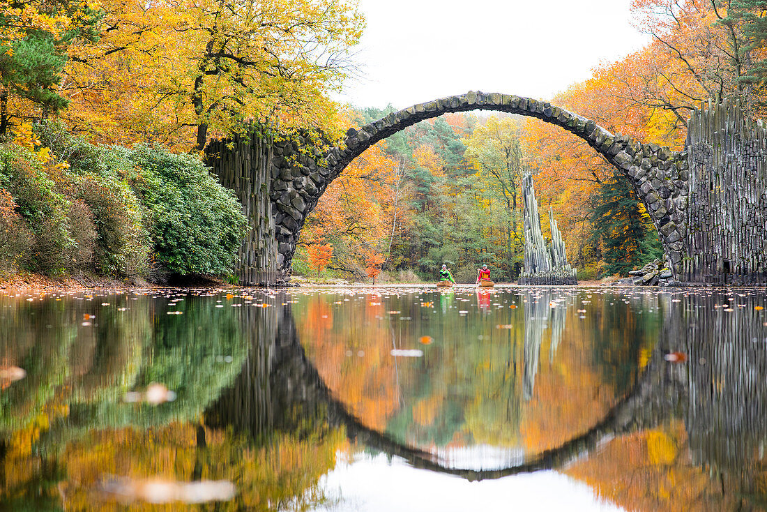 Canoeing in autumn on the Rakotzsee, Saxony, Germany