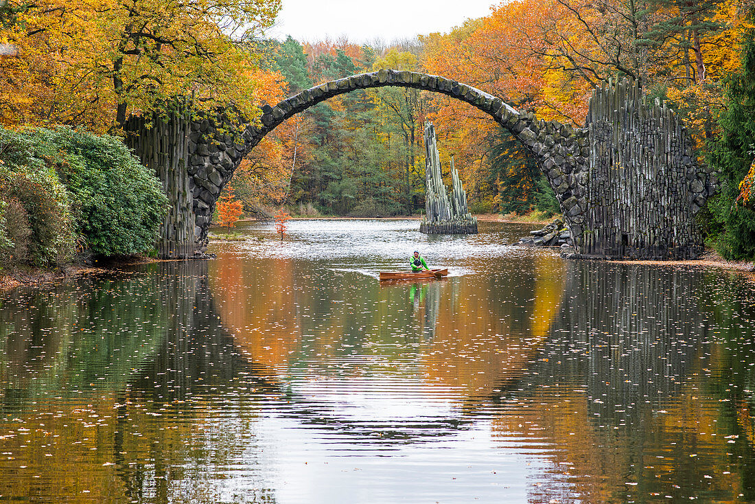 Canoeing in autumn on the Rakotzsee, Saxony, Germany