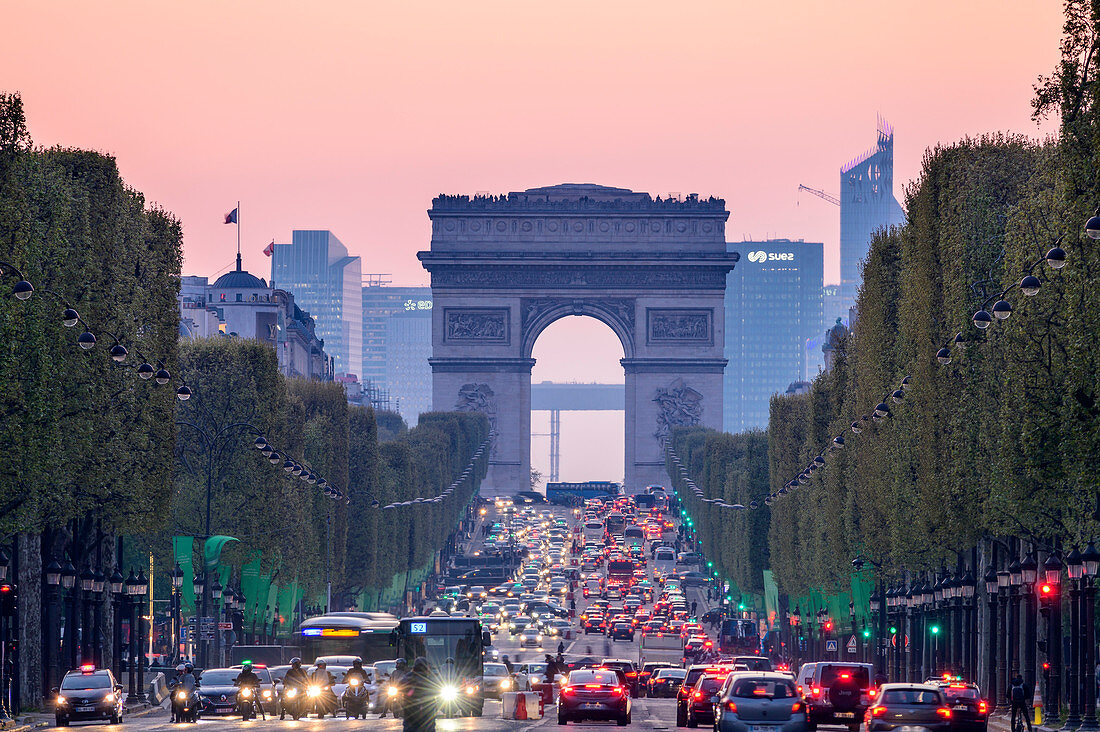 Evening Champs-Elysees with Arc de Triomphe and La Defense in the background, Paris, France