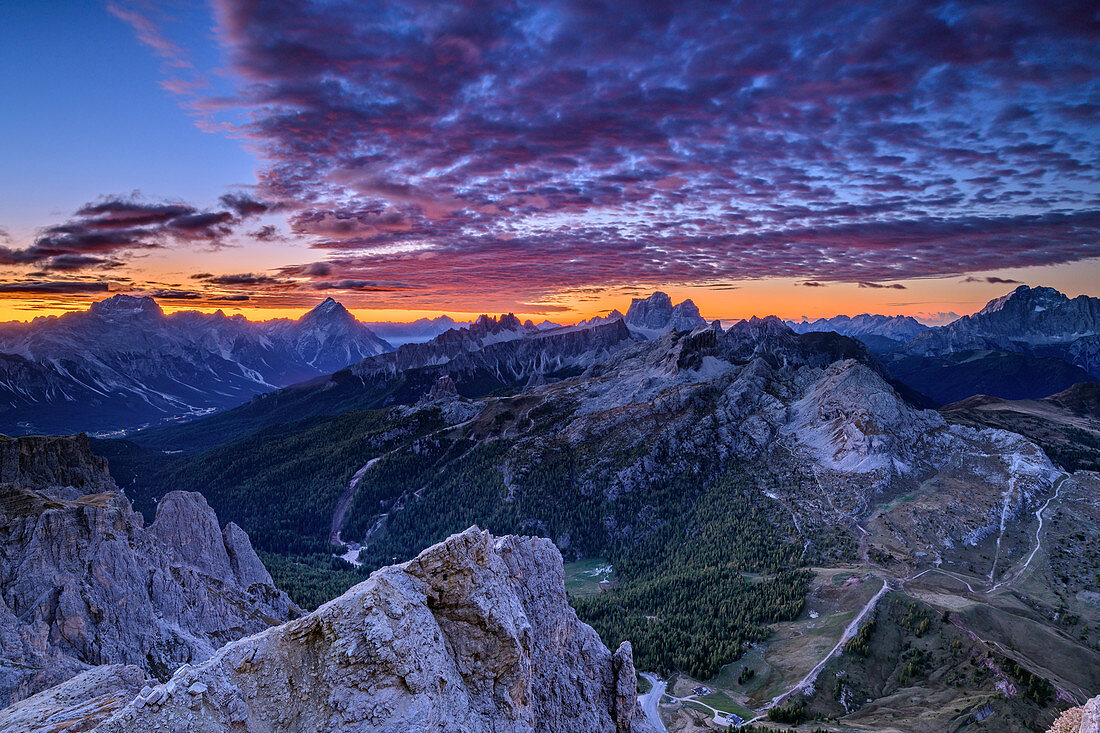 Morning mood with red clouds over Sorapis, Antelao, Monte Pelmo and Civetta, Dolomites, UNESCO World Heritage Dolomites, Veneto, Italy