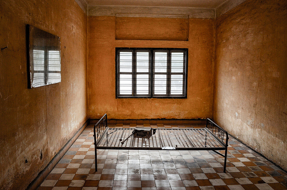 Interior view of prison cell at the Tuol Sleng Genocide Museum, Phnom Penh, Cambodia.