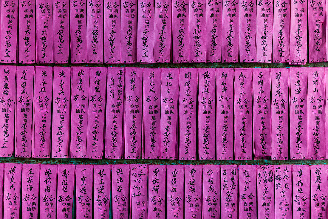 Close up of purple scrolls at Thien Hau pagoda in Ho Chi Minh City, Vietnam.