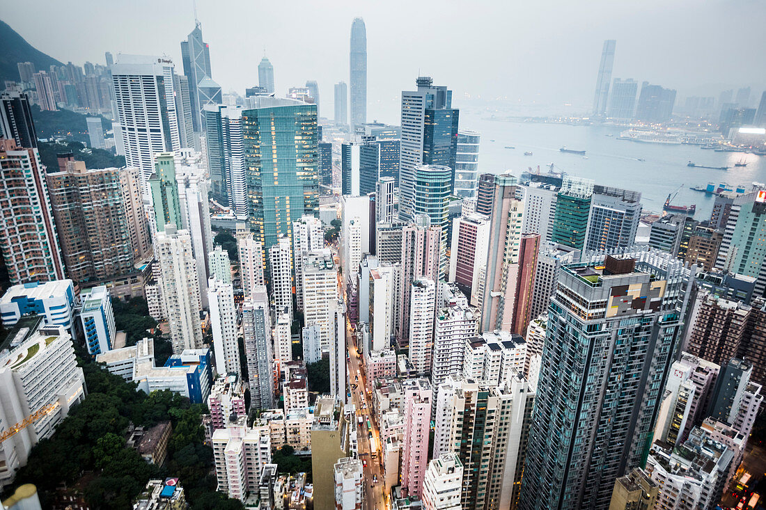 High angle view over dense cityscape with tall skyscrapers.