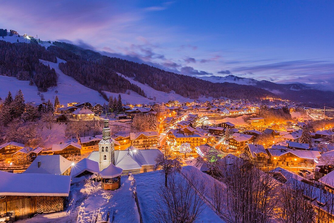 France, Haute-Savoie, Morzine, the valley of Aulps, ski slopes of the Portes du Soleil, seen on the church Sainte-Marie-Madeleine of 1805 and the Pleney (1554m)